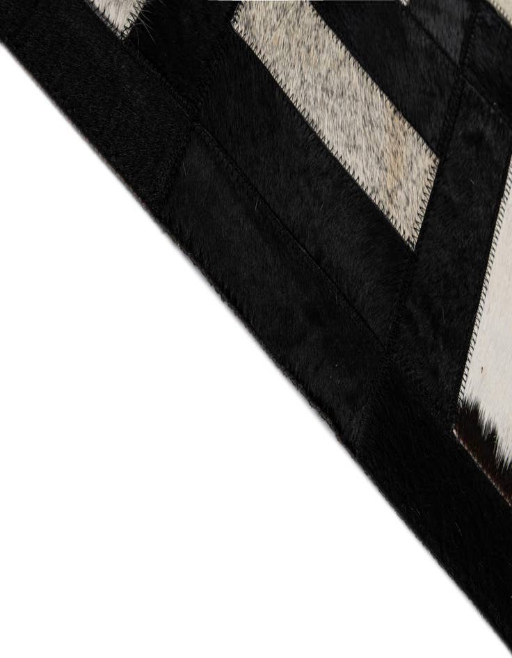 Detail image of  5' 3 x 8' 1 Cowhide - Patchwork Rug