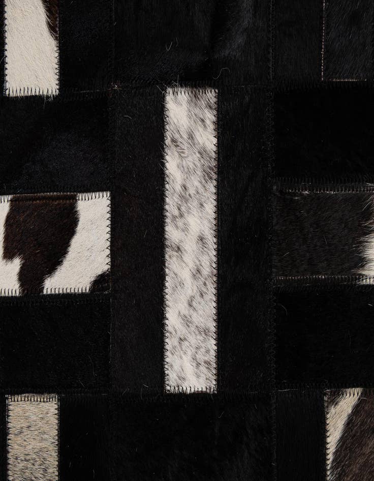 Detail image of  5' 3 x 8' 1 Cowhide - Patchwork Rug