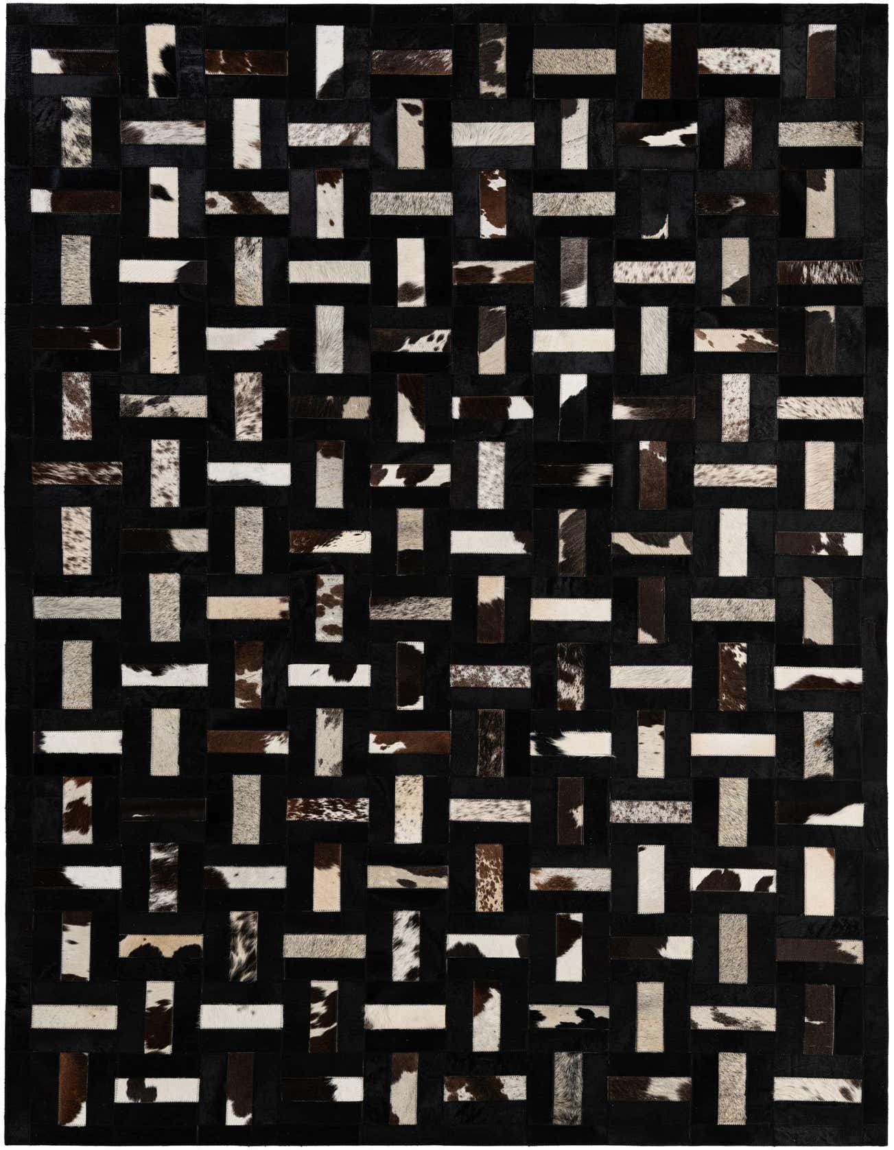 A rectangular 5x8 modern patchwork cowhide rug featuring a multi-colored stripe pattern with black, brown, and white natural hide sections.