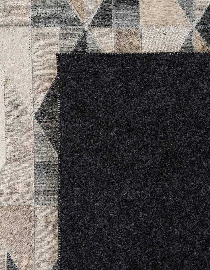 Detail image of  5' 2 x 7' 8 Cowhide - Patchwork Rug