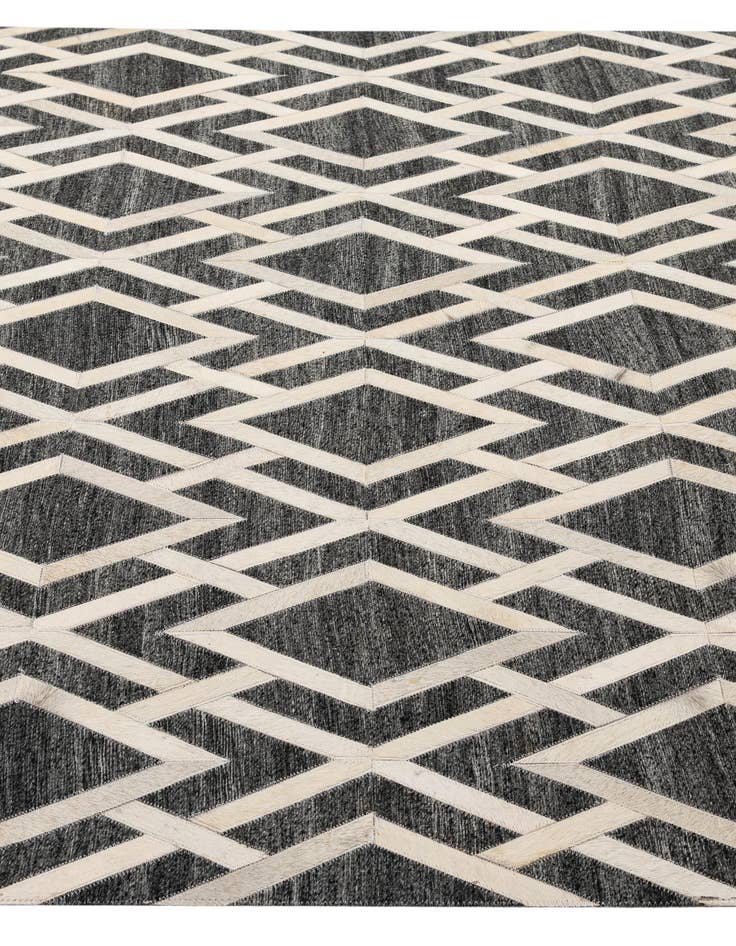 Detail image of  5' 1 x 7' 11 Cowhide - Patchwork Rug