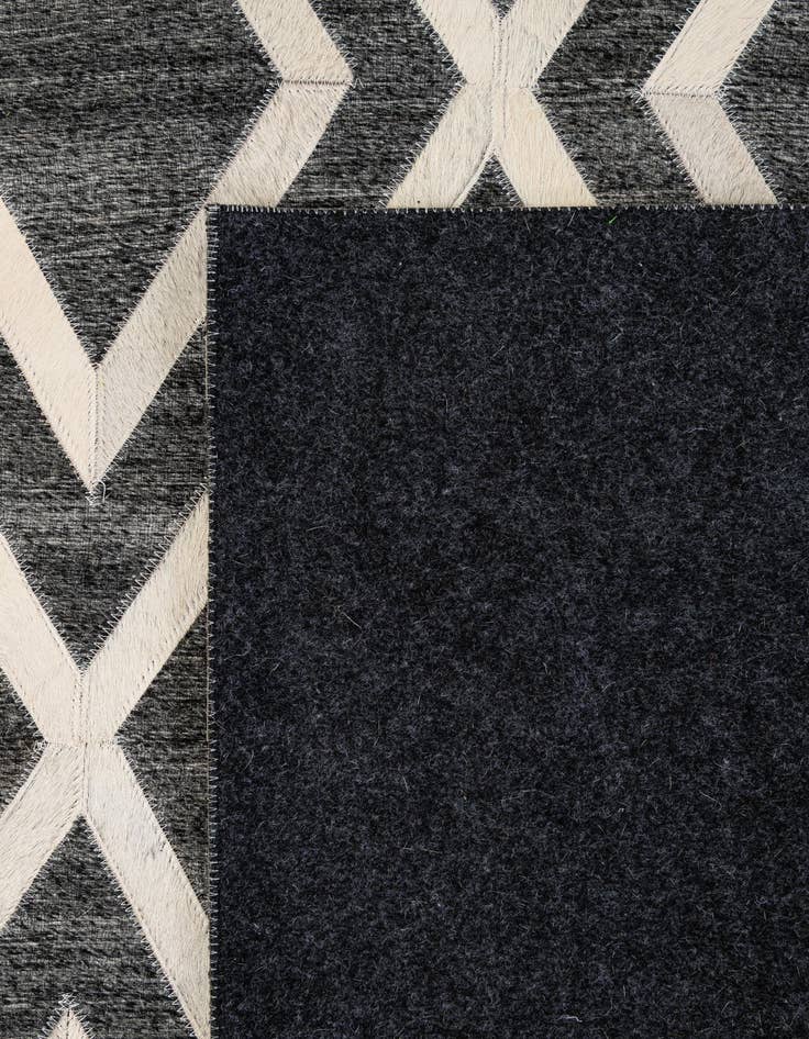 Detail image of  5' 1 x 7' 11 Cowhide - Patchwork Rug
