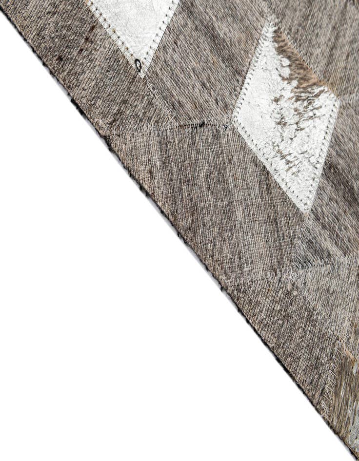 Detail image of  5' 2 x 7' 11 Cowhide - Patchwork Rug