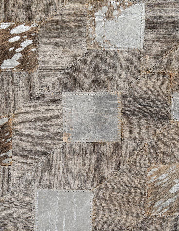 Detail image of  5' 2 x 7' 11 Cowhide - Patchwork Rug