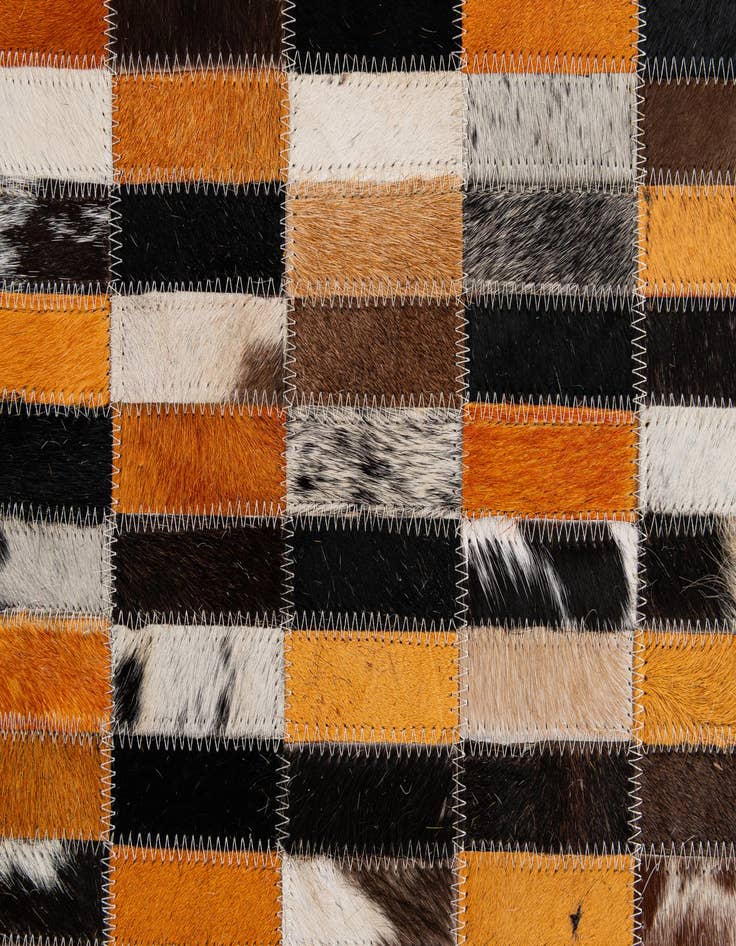 Detail image of  4' 11 x 7' 10 Cowhide - Patchwork Rug
