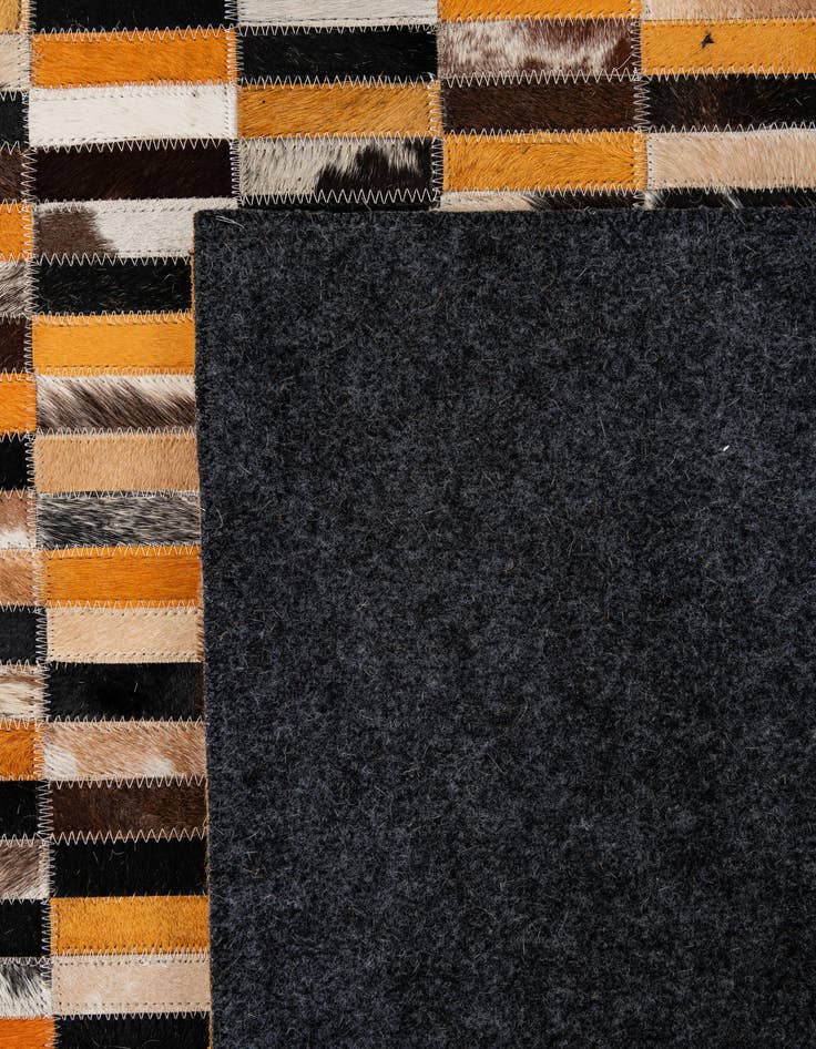 Detail image of  4' 11 x 7' 10 Cowhide - Patchwork Rug
