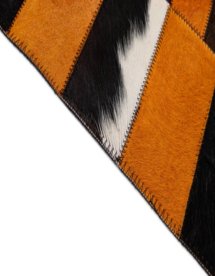 Detail image of  5' 1 x 7' 11 Cowhide - Patchwork Rug