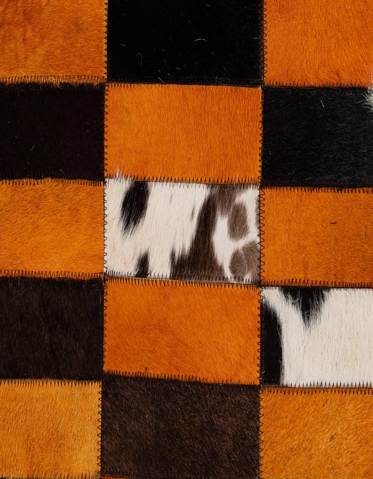 Detail image of  5' 1 x 7' 11 Cowhide - Patchwork Rug