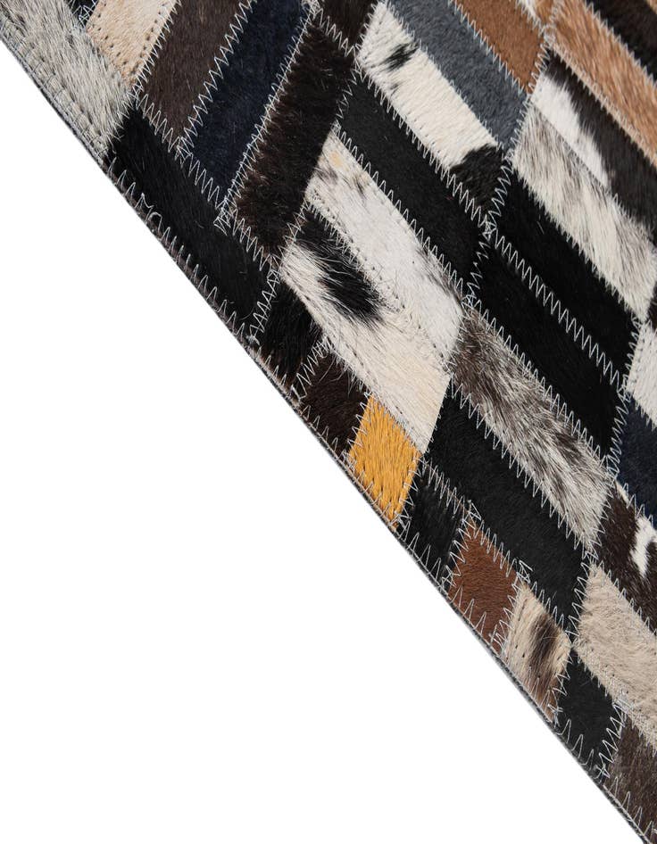 Detail image of  5' 1 x 8' 2 Cowhide - Patchwork Rug