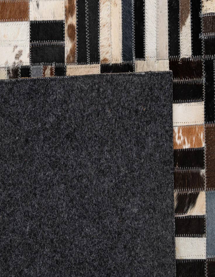 Detail image of  5' 1 x 8' 2 Cowhide - Patchwork Rug