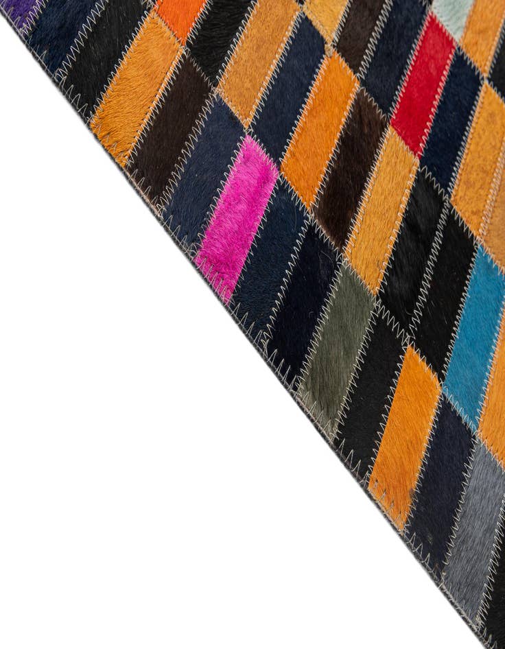 Detail image of  5' 1 x 7' 11 Cowhide - Patchwork Rug