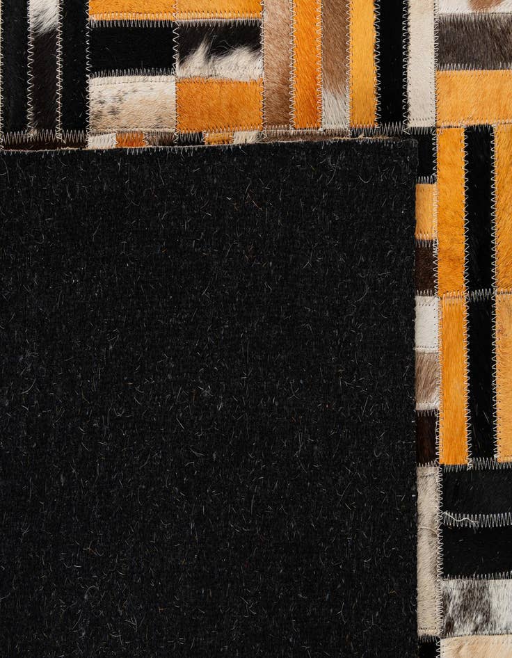 Detail image of  5' x 7' 11 Cowhide - Patchwork Rug