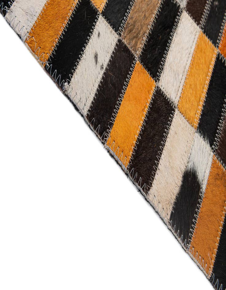 Detail image of  5' 1 x 7' 11 Cowhide - Patchwork Rug
