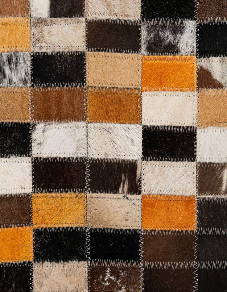 Detail image of  5' 1 x 7' 11 Cowhide - Patchwork Rug