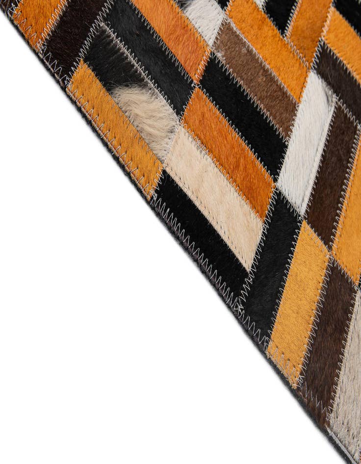Detail image of  4' 11 x 7' 10 Cowhide - Patchwork Rug