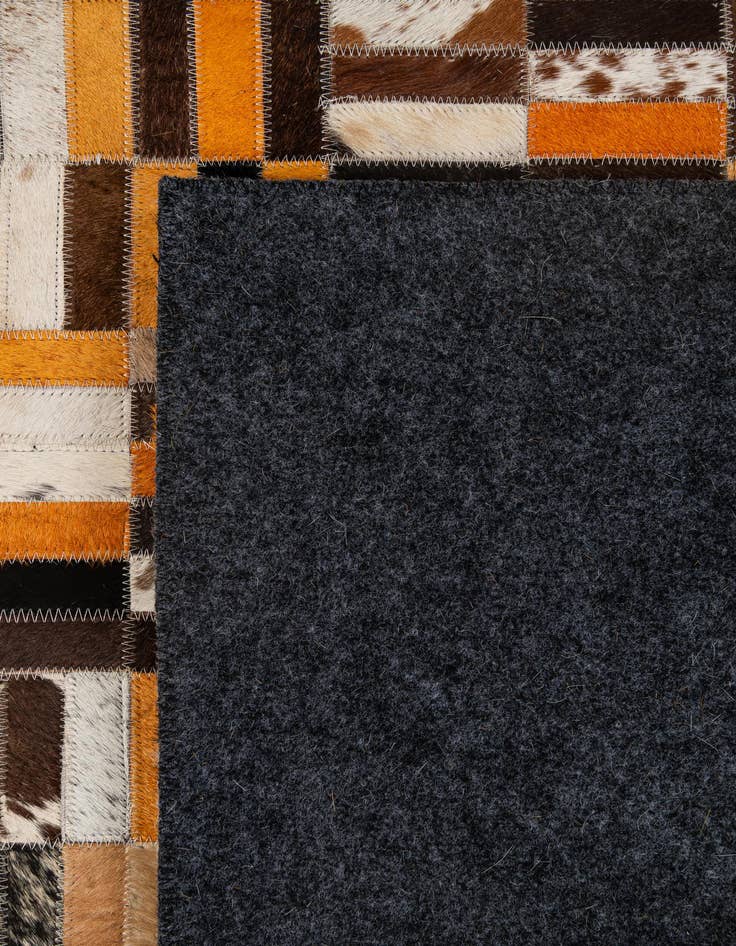 Detail image of  4' 11 x 7' 10 Cowhide - Patchwork Rug