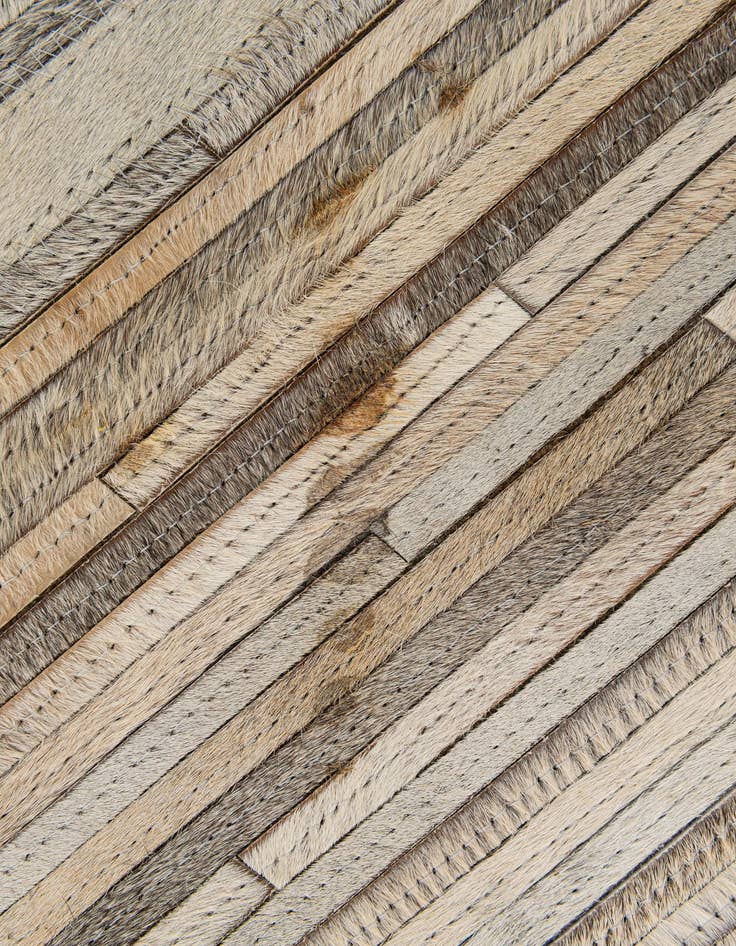 Detail image of  5' 7 x 8' 9 Cowhide - Patchwork Rug