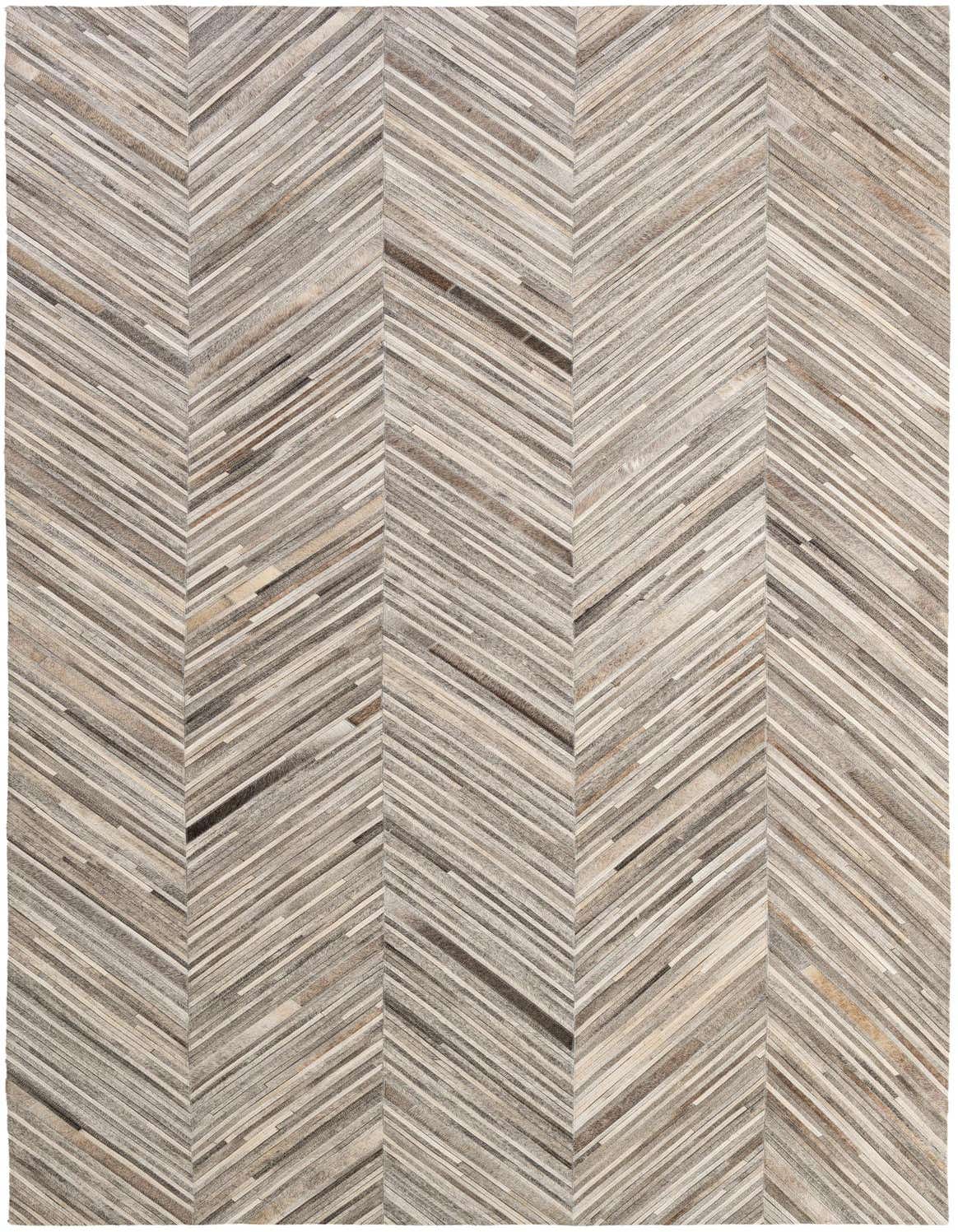 A 6x9 rectangular multi-colored cowhide rug with a modern chevron stripe pattern, perfect for a living room.