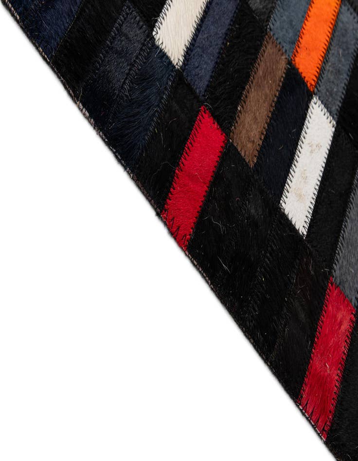 Detail image of  5' 2 x 7' 11 Cowhide - Patchwork Rug