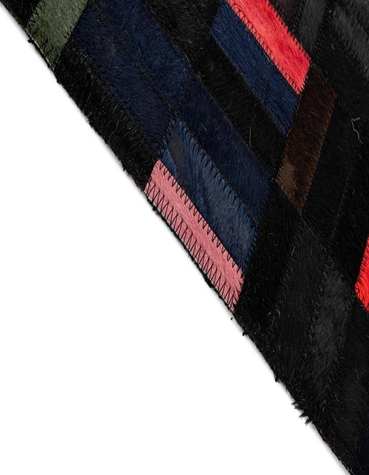 Detail image of  5' 1 x 8' 1 Cowhide - Patchwork Rug