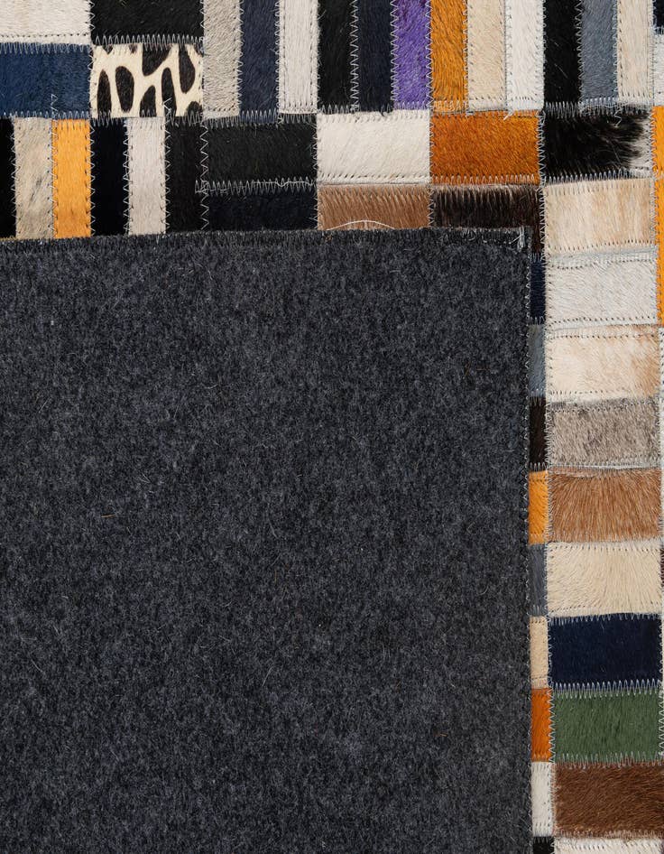 Detail image of  5' 1 x 7' 11 Cowhide - Patchwork Rug