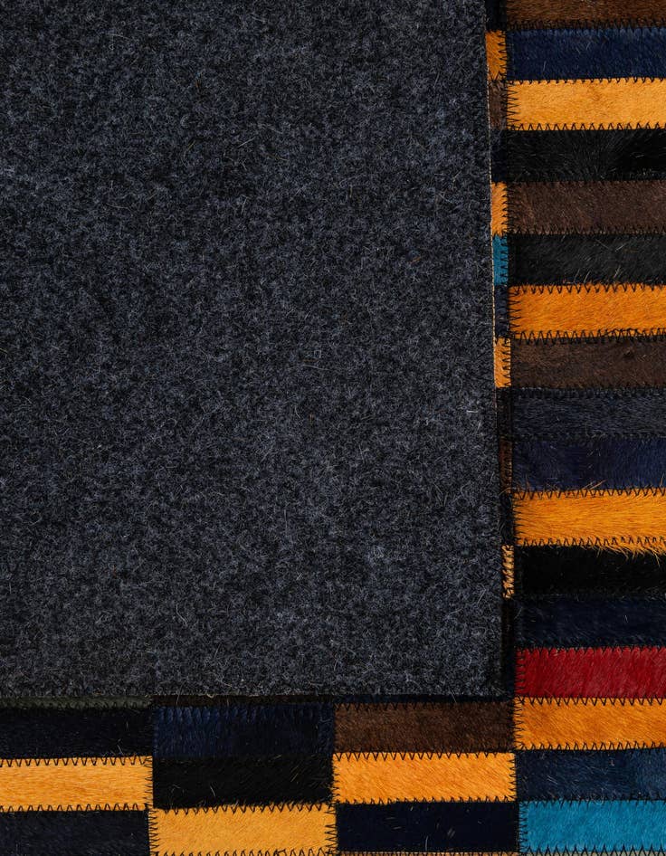 Detail image of  5' 2 x 7' 11 Cowhide - Patchwork Rug