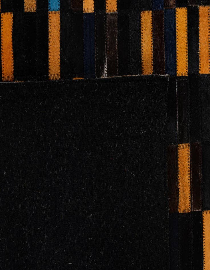 Detail image of  5' 2 x 7' 11 Cowhide - Patchwork Rug