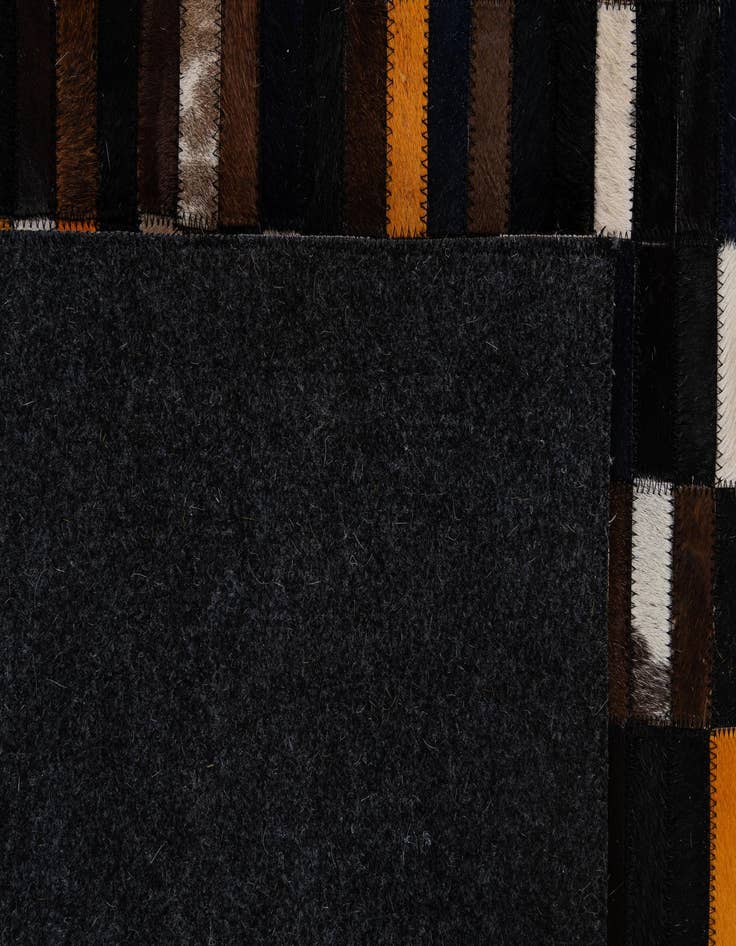 Detail image of  4' 11 x 8' Cowhide - Patchwork Rug