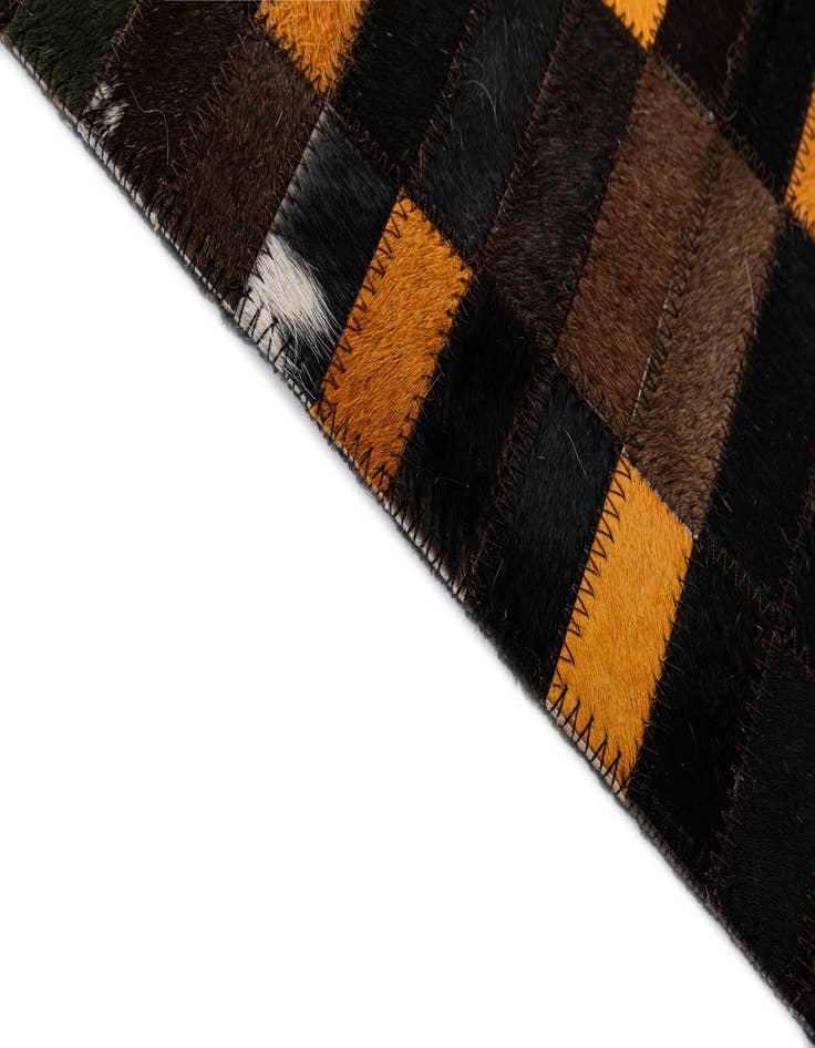 Detail image of  5' 1 x 8' 1 Cowhide - Patchwork Rug