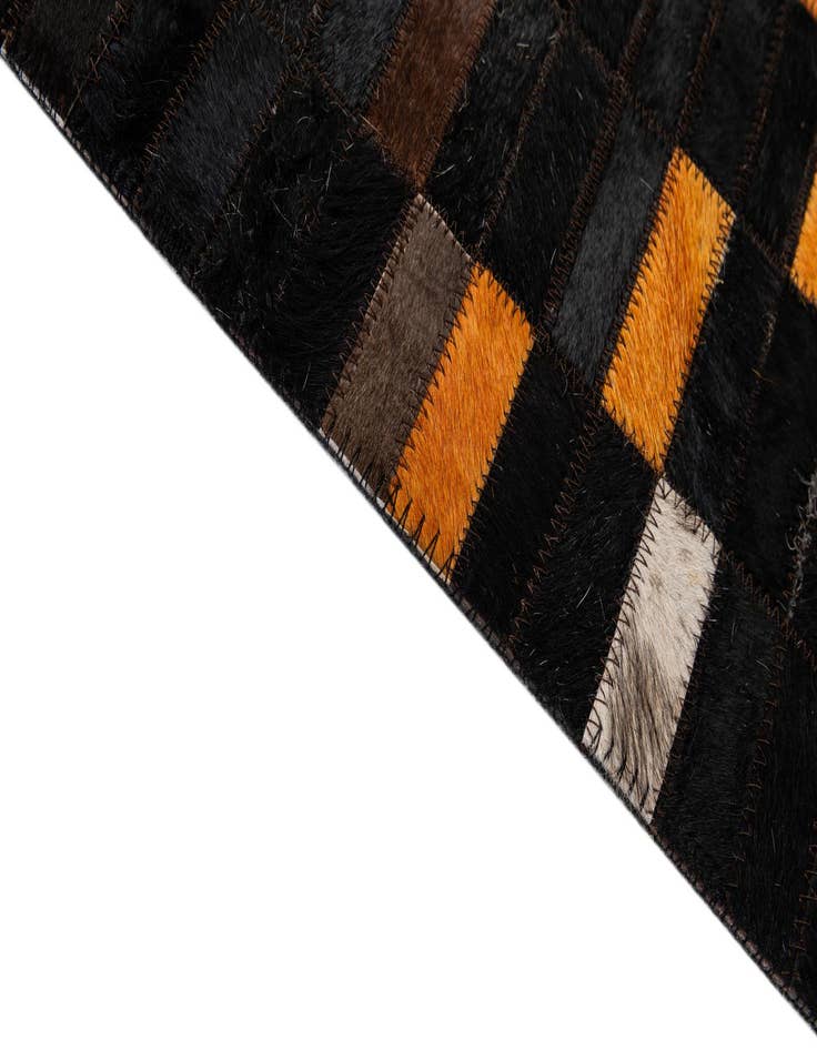 Detail image of  5' 1 x 7' 11 Cowhide - Patchwork Rug