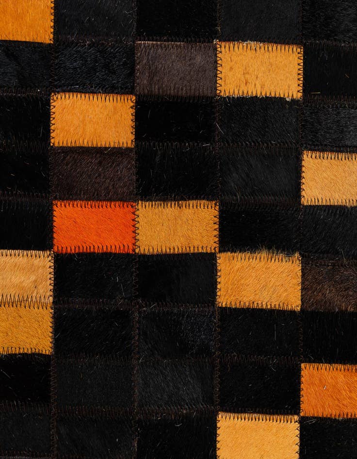 Detail image of  5' 1 x 7' 11 Cowhide - Patchwork Rug