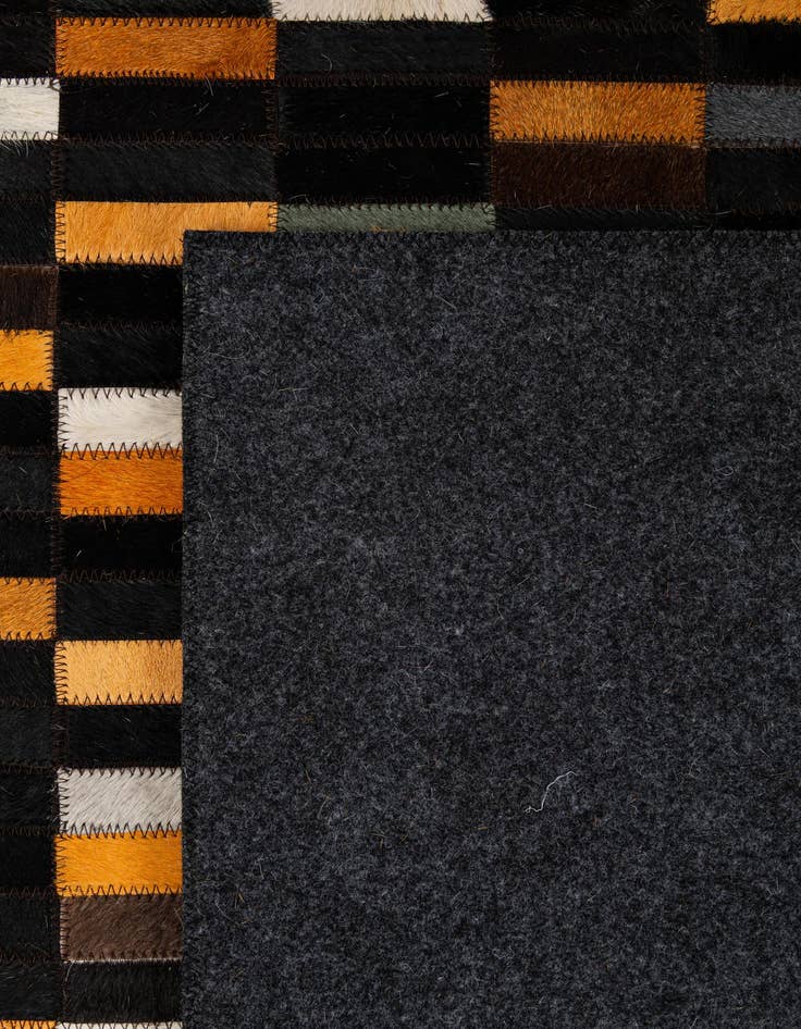 Detail image of  5' 1 x 7' 11 Cowhide - Patchwork Rug