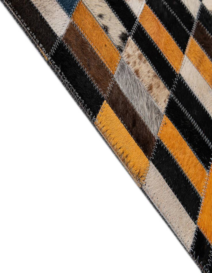 Detail image of  5' 1 x 8' 2 Cowhide - Patchwork Rug