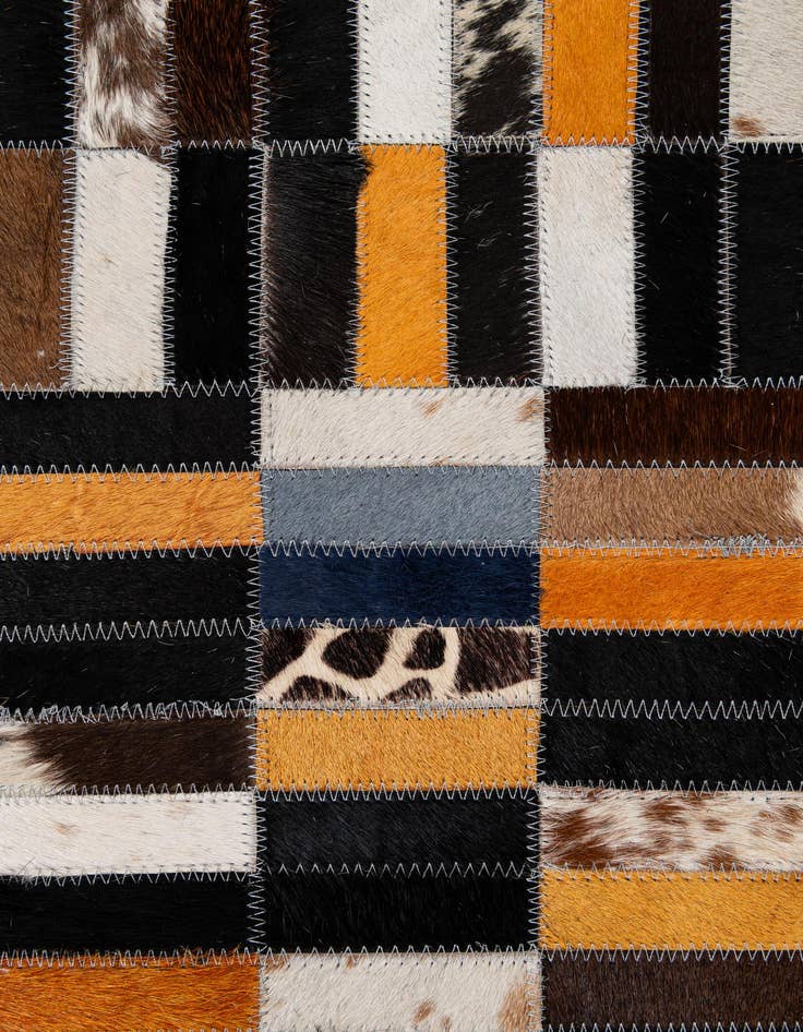 Detail image of  5' 1 x 8' 2 Cowhide - Patchwork Rug