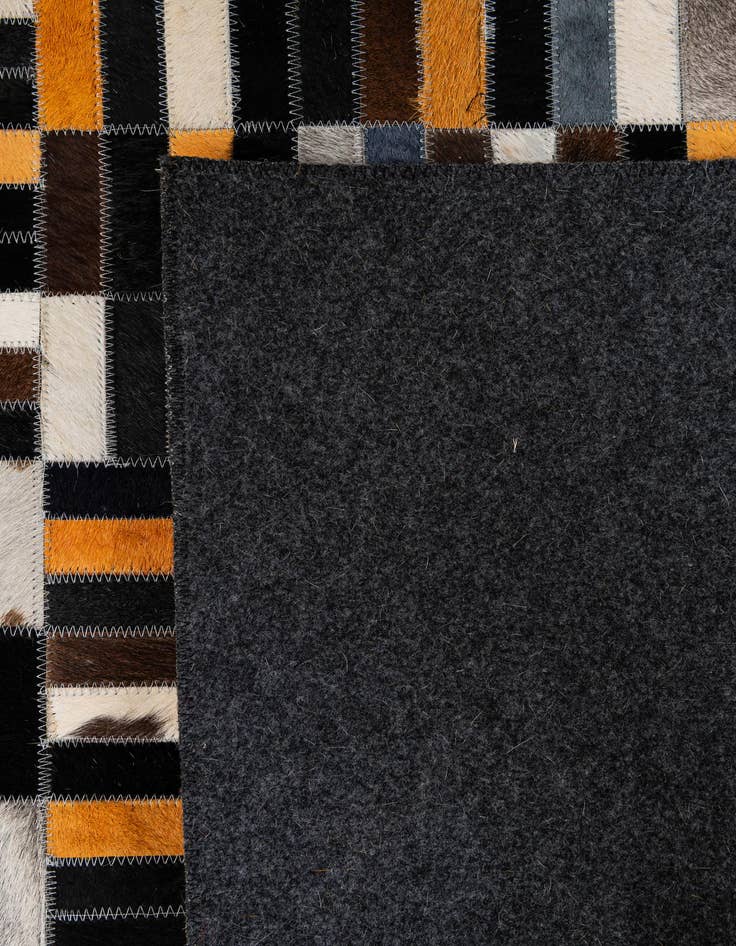Detail image of  5' 1 x 8' 2 Cowhide - Patchwork Rug