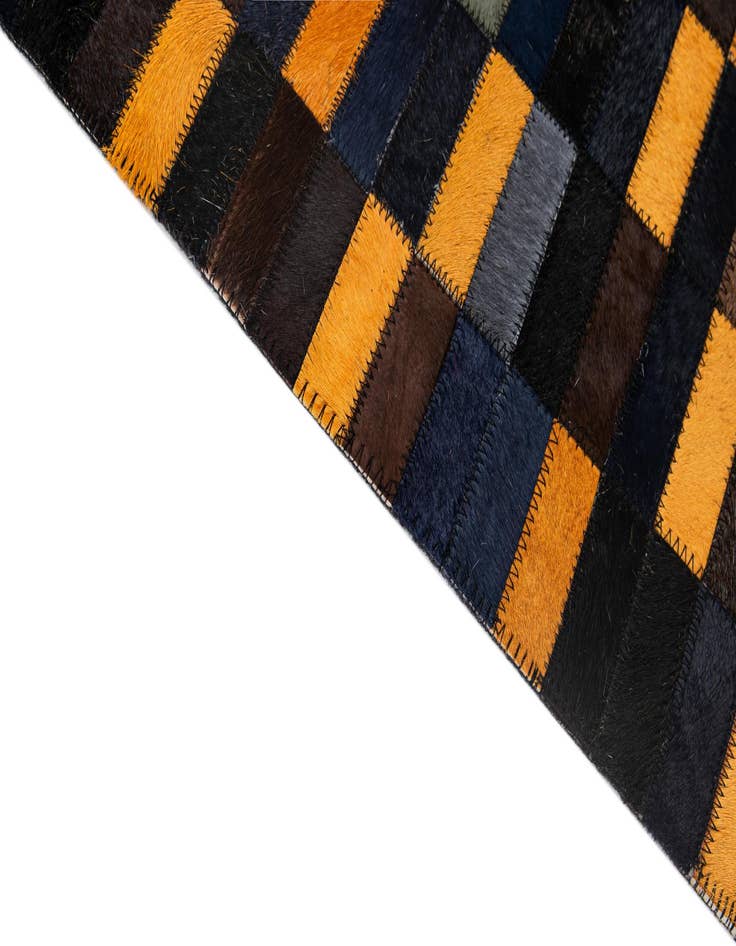 Detail image of  5' 2 x 7' 11 Cowhide - Patchwork Rug