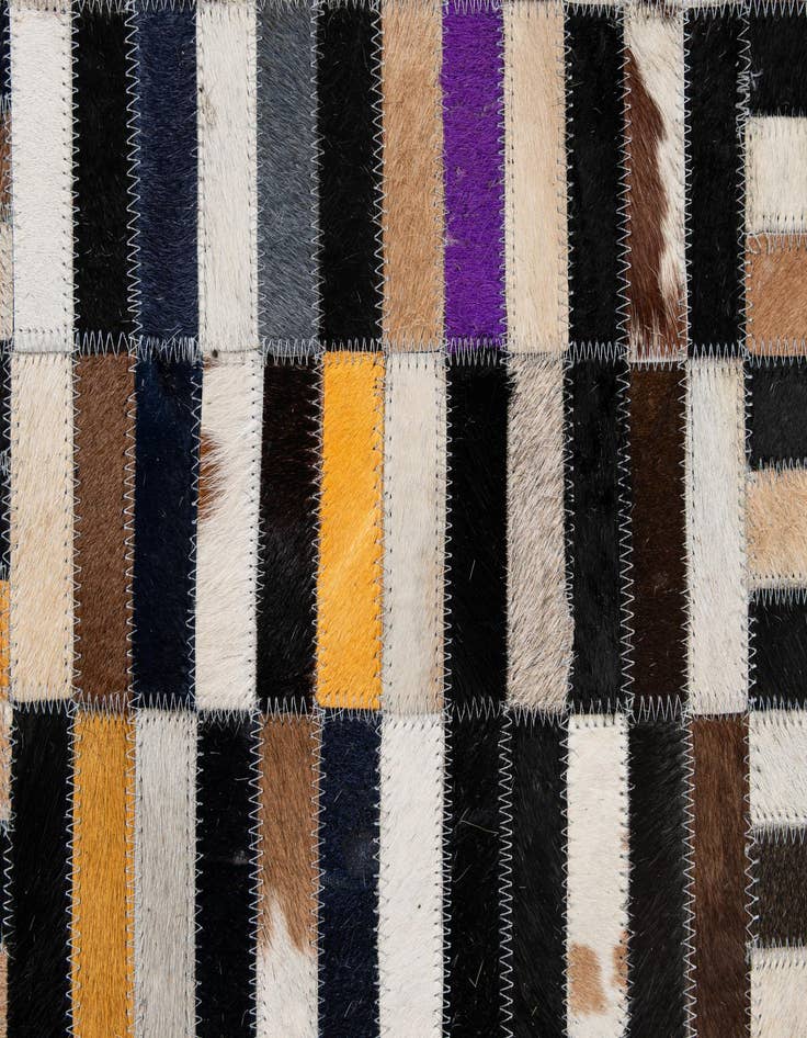 Detail image of  5' 1 x 8' 2 Cowhide - Patchwork Rug