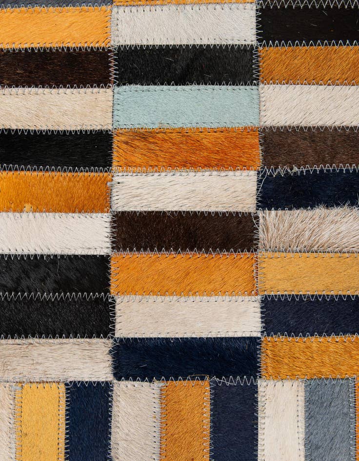 Detail image of  5' 1 x 7' 11 Cowhide - Patchwork Rug