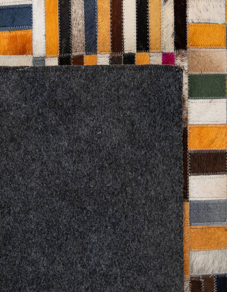 Detail image of  5' 1 x 7' 11 Cowhide - Patchwork Rug