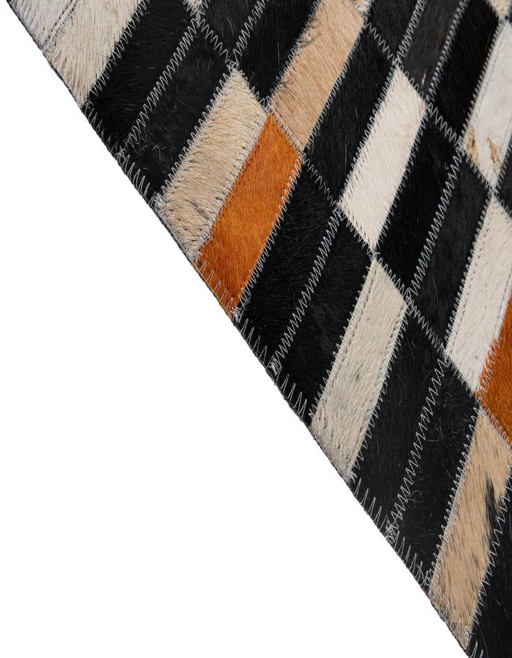Detail image of  5' 3 x 8' 1 Cowhide - Patchwork Rug