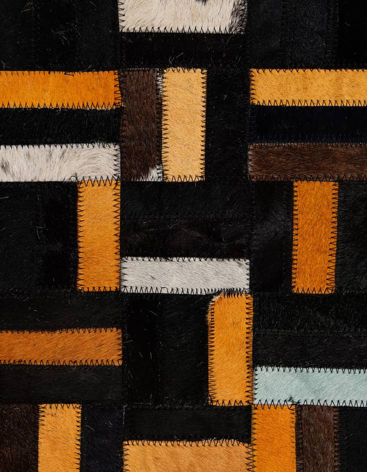 Detail image of  5' 1 x 7' 11 Cowhide - Patchwork Rug