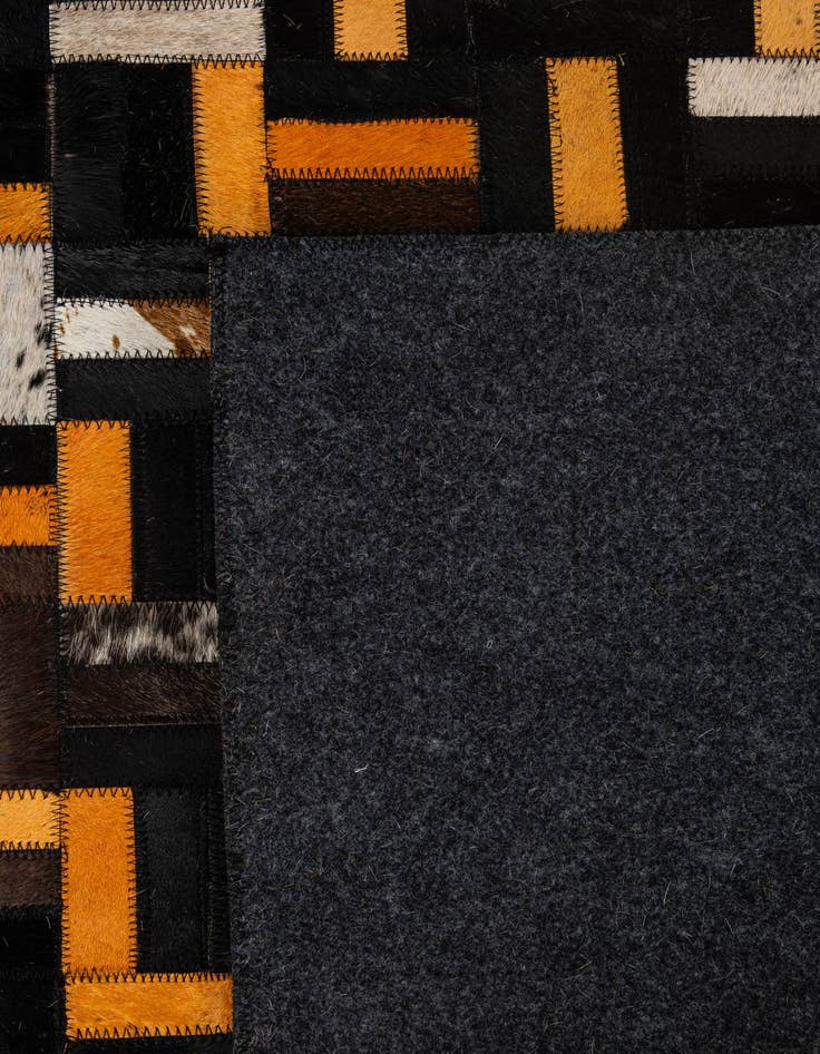 Detail image of  5' 1 x 7' 11 Cowhide - Patchwork Rug
