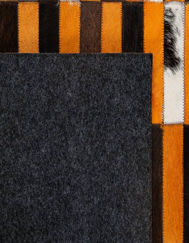 Detail image of  5' 1 x 7' 11 Cowhide - Patchwork Rug