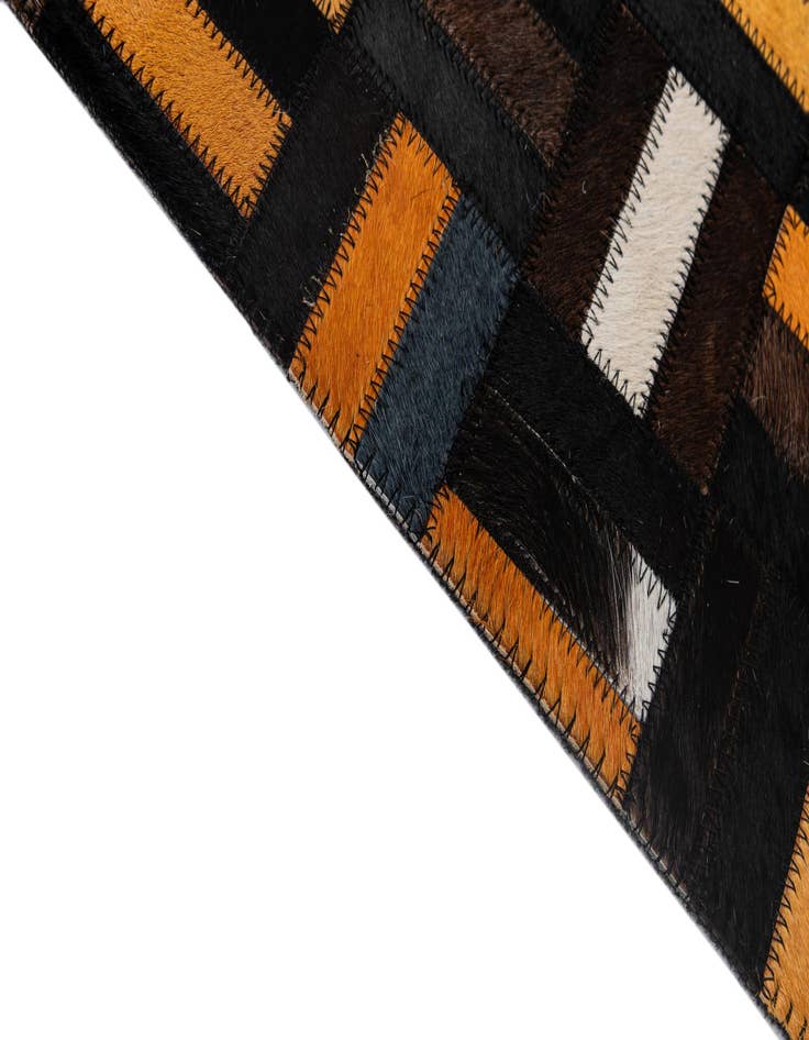 Detail image of  5' 1 x 7' 11 Cowhide - Patchwork Rug