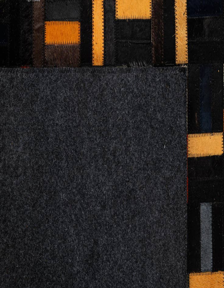 Detail image of  5' 1 x 7' 11 Cowhide - Patchwork Rug