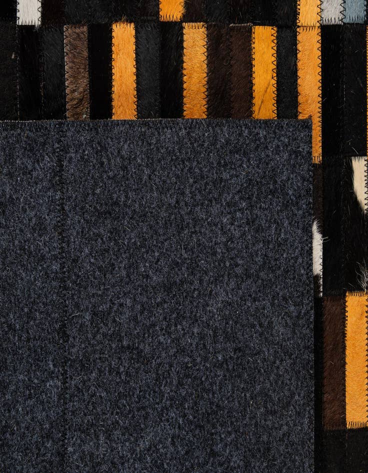 Detail image of  5' 2 x 8' Cowhide - Patchwork Rug