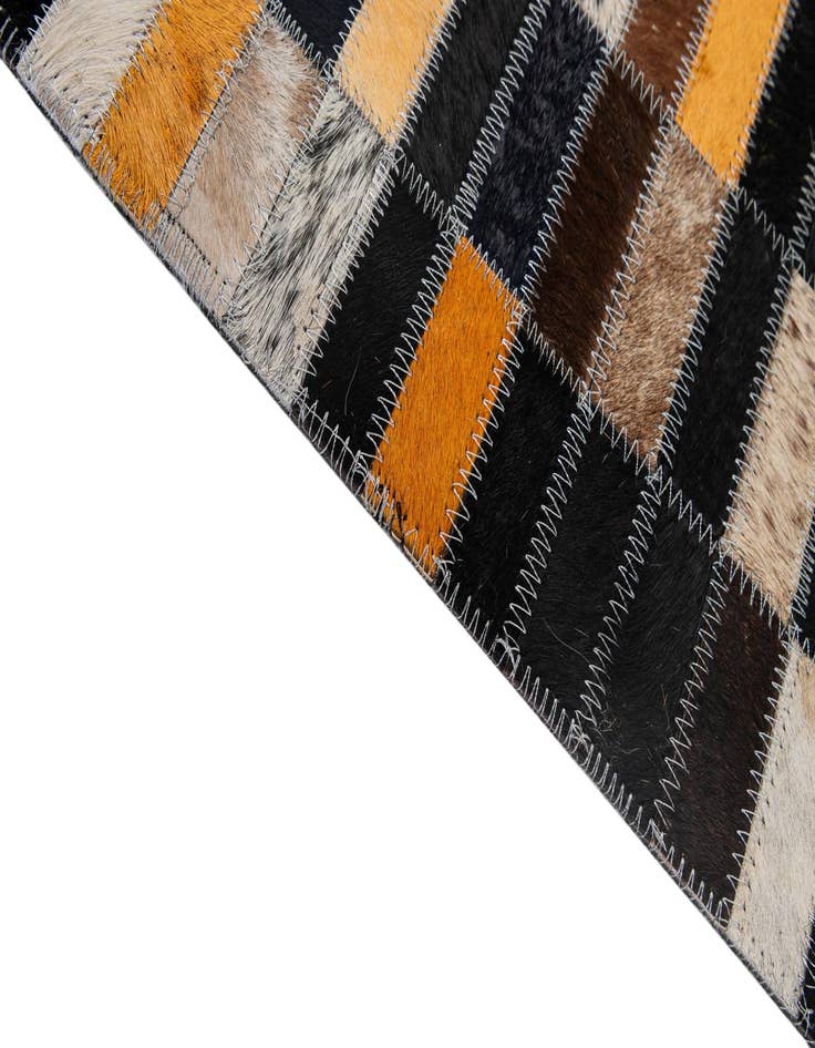 Detail image of  4' 11 x 7' 11 Cowhide - Patchwork Rug