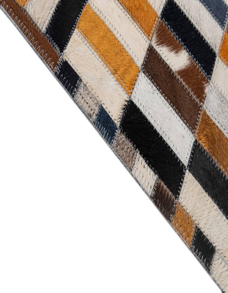 Detail image of  5' 1 x 7' 10 Cowhide - Patchwork Rug