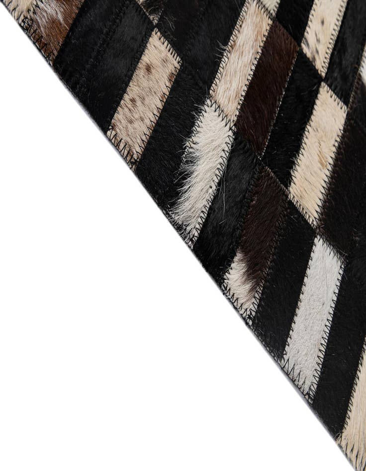 Detail image of  5' 2 x 8' Cowhide - Patchwork Rug