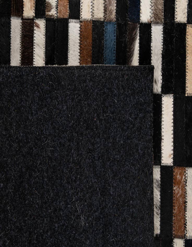 Detail image of  5' 2 x 8' Cowhide - Patchwork Rug